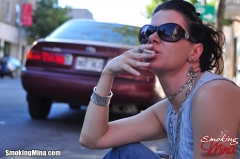 Sensual smoking vixen Mina enjoys blowing smoke rings