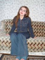 Teen redhead posing and showing shaved pussy