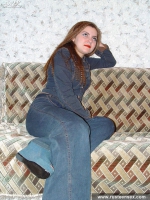 Teen redhead posing and showing shaved pussy