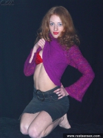 Russian teen redhead takes off red lingerie and masturbates