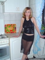 Russian teen in high-heel boots shows shaved pussy