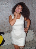 Mature brunette with big tits