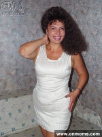 Mature brunette with big tits