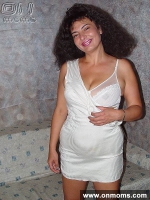 Mature brunette with big tits