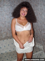 Mature brunette with big tits