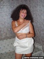 Mature brunette with big tits