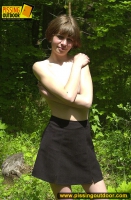 Pissing outdoor in the summer forest