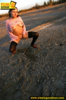 Pissing outdoor in the sunset