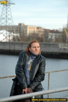 Pissing on the bridge over river