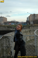 Pissing on the bridge over river