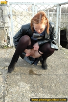 Pissing on the bridge over river