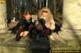 Girls pissing together outdoor