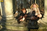 Girls pissing together outdoor