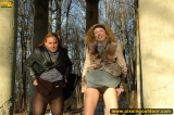 Girls pissing together outdoor
