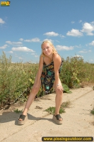 Pissing outdoor in rural fields