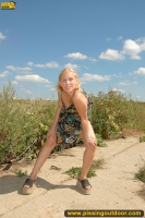 Pissing outdoor in rural fields