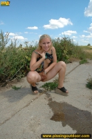Pissing outdoor in rural fields