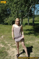 Outdoor pissing on the road wetting it with pee
