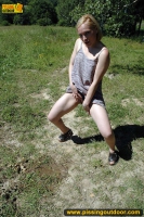 Outdoor pissing on the road wetting it with pee