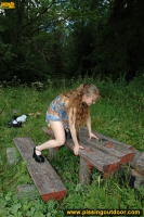 Outdoor flagrant pissing of teen blonde walking in the