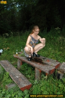 Outdoor flagrant pissing of teen blonde walking in the