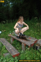 Outdoor flagrant pissing of teen blonde walking in the