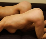 Both naked on sofa