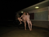 American couple posing to ranch