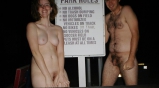 American couple posing to ranch