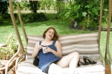 Lady relaxing in black nylon panties