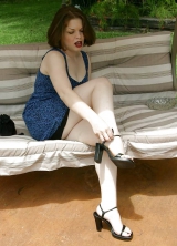 Lady relaxing in black nylon panties
