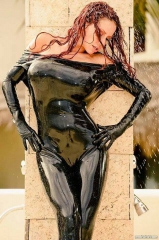 Latex lesbian oiled