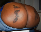 Big fat ass initials tattooed