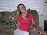 Glasses Wearing Tattooed Babe