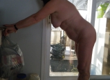 housewife pose in the houise