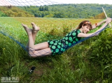 Nude teen in a hammock