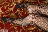 Girl poses in stockings