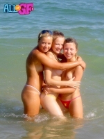 Naughty girlfriends beach posing