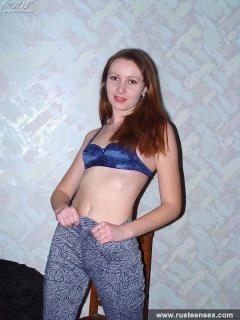 Young longhaired brunette stripping - N