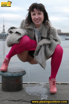 Outdoor pissing on embankment by MILF brunette - N