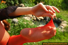 Red fishnet pantyhose outdoor - N