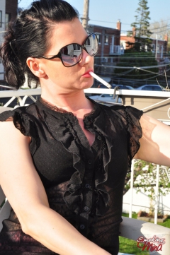 Brunette babe smoking at the terrace - N