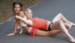 Two laszive girls are playing on the road - N