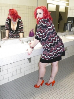 April washes her feet in the ladys room - N