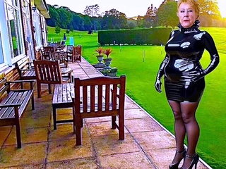 Cathy Shiny PVC Skirt High Heels Parading on Golf Club Patio
