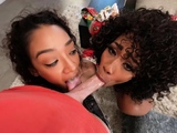 Two black babes took turns sucking Alex cock