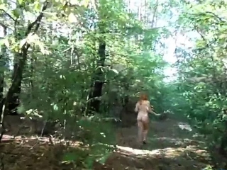 chubby girl with big booty walking nude in forest