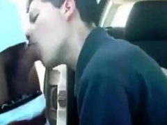 Sucking a cock seated in his car