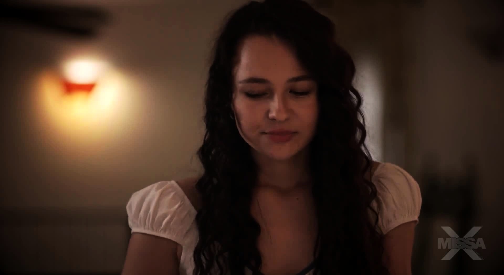 A teen sexy brunette using a tool