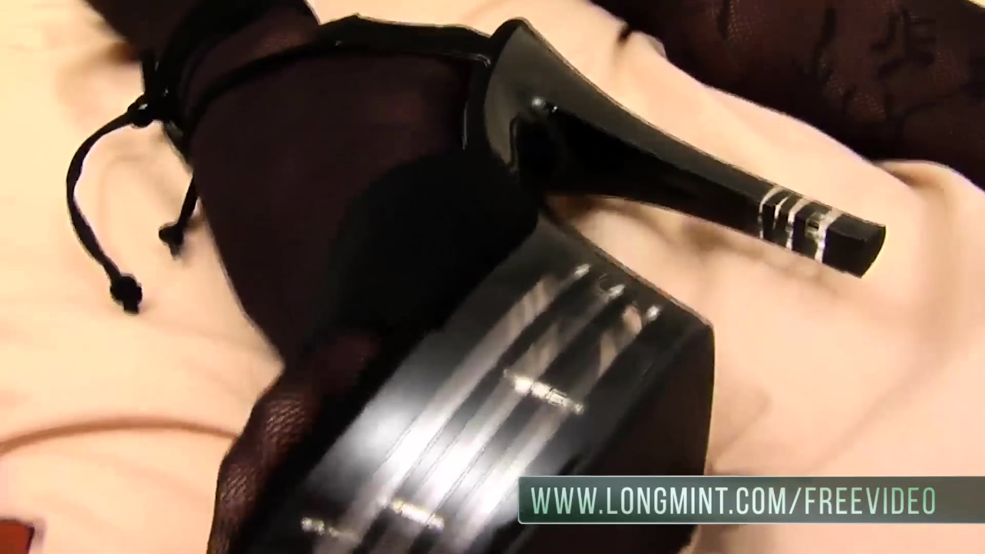 Brunette ladyboy in red thongs teases with her monster cock